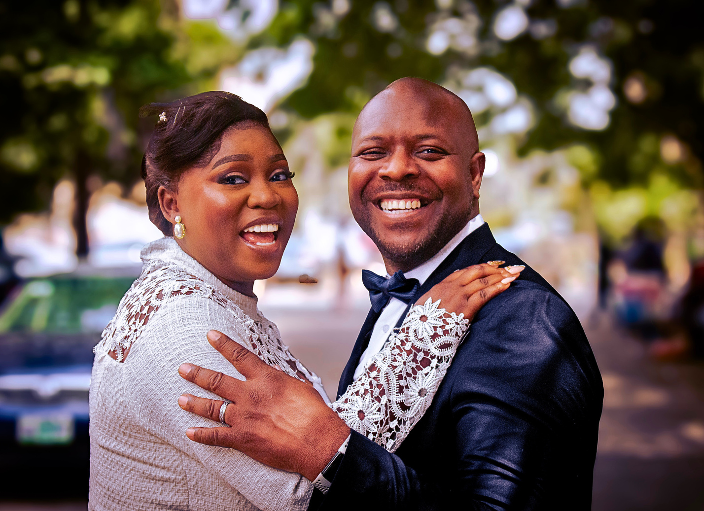 A joyful newlywed couple on their wedding day